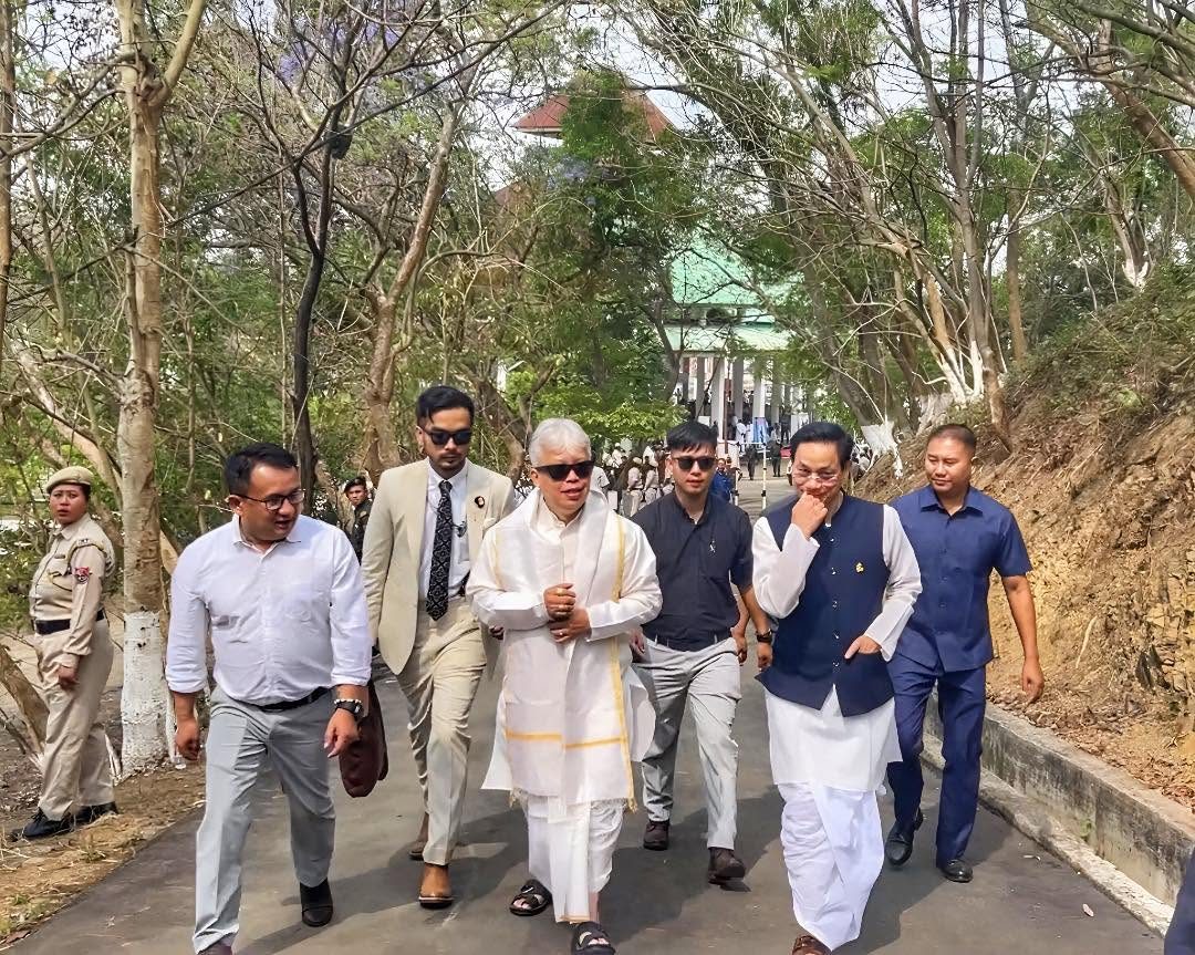Walking with colleagues in traditional attire