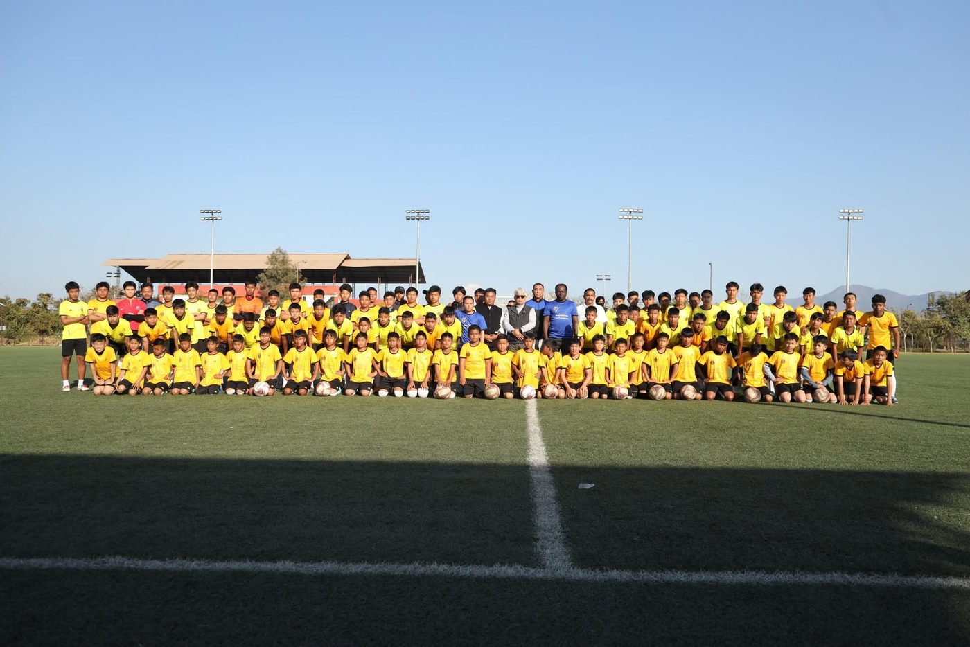 With young footballers at the academy ground